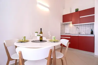Kuhinja ili čajna kuhinja u objektu Hektorovic poolside apartments