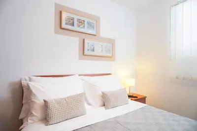 Krevet ili kreveti u jedinici u objektu Hektorovic poolside apartments