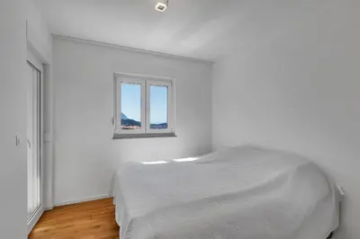 Krevet ili kreveti u jedinici u objektu Seaview Apartment Ella