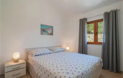 Krevet ili kreveti u jedinici u objektu 2 Bedroom Lovely Home In Praznica