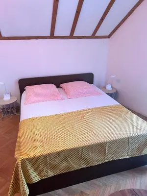 Krevet ili kreveti u jedinici u objektu maison ancienne sur l ile de Brac