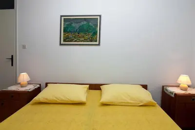 Krevet ili kreveti u jedinici u objektu Sara apartment Punta Omis near sandy beach