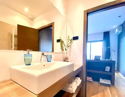 Krevet ili kreveti u jedinici u objektu Villa FORTE-Exclusive Retreat, Heated Infinity Pool & Amazing Views