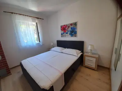 Krevet ili kreveti u jedinici u objektu HOUSE-APARTMENTS ELA -MIRCA- FAMILY HOLIDAY