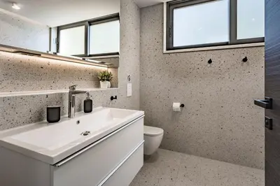 Kupaonica u objektu Villa Dispet, sea view, heated pool, cinema, wellness