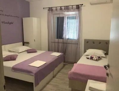 Krevet ili kreveti u jedinici u objektu Apartments Nela