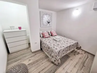 Krevet ili kreveti u jedinici u objektu Modern flat in Omiš, with terrace and views, 80m²