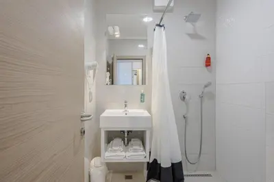 Kupaonica u objektu Rogač Rooms & Restaurant