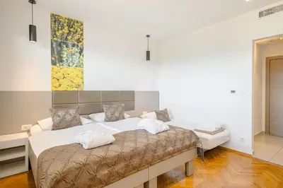 Krevet ili kreveti u jedinici u objektu Rogač Rooms & Restaurant