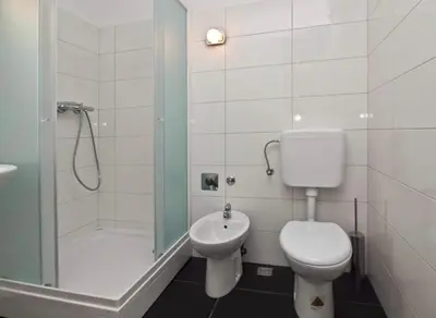 Kupaonica u objektu Apartment near sandy beach