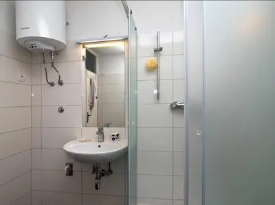 Kupaonica u objektu Apartment near sandy beach
