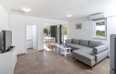 TV i/ili zabavni centar u objektu House Nane Garden