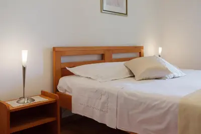 Krevet ili kreveti u jedinici u objektu Roko Apartment - Charme Holidays