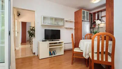 TV i/ili zabavni centar u objektu Nona Guesthouse - Charme Holidays