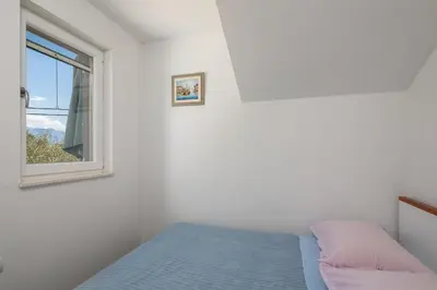 Krevet ili kreveti u jedinici u objektu Seaside Apartment Kamelia