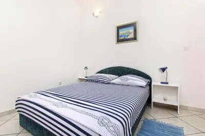 Krevet ili kreveti u jedinici u objektu Apartments Kirigin