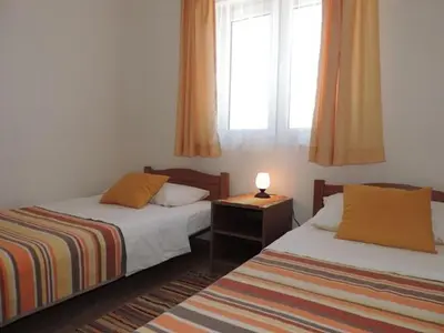 Krevet ili kreveti u jedinici u objektu Apartment in Duce with sea view, balcony, air conditioning, W-LAN 5067-4