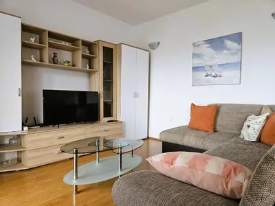 TV i/ili zabavni centar u objektu Apartment Nedo with Sea View