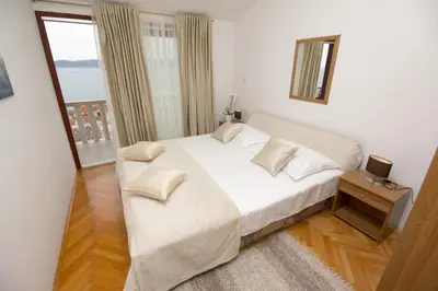 Krevet ili kreveti u jedinici u objektu Apartment in Pisak with sea view, balcony, air conditioning, WiFi 3340-4