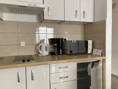 Kuhinja ili čajna kuhinja u objektu Apartment in Povlja with terrace, air conditioning, WiFi, washing machine 3419-3