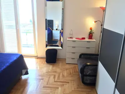 TV i/ili zabavni centar u objektu Apartment ELENA 40 m2 with beautiful wide sea views 3 stars