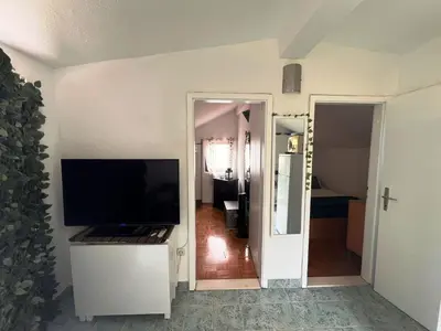 TV i/ili zabavni centar u objektu Apartment Dolce Vita - 40 m to the sea & Beach-sleeps 3