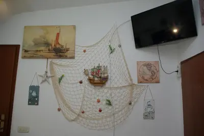 TV i/ili zabavni centar u objektu Rooms Tia