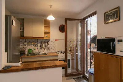 Kuhinja ili čajna kuhinja u objektu Apartman Silna your new home with terrace and garden