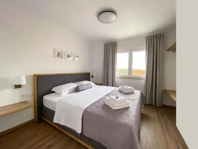 Krevet ili kreveti u jedinici u objektu Marisa Apartments Hvar III