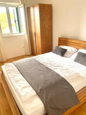 Krevet ili kreveti u jedinici u objektu Apartment Bol A6 with Pool from 45 EUR per Person