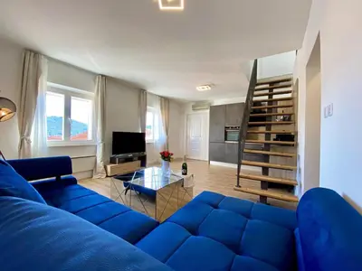 TV i/ili zabavni centar u objektu Villa FJERA - sea view, hot tubs, terrace, BBQ