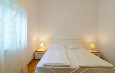 Krevet ili kreveti u jedinici u objektu Gorgeous Home In Postira