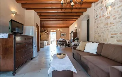 TV i/ili zabavni centar u objektu Holiday Home With 2 Bedroom