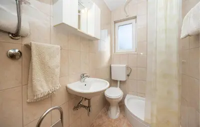 Kupaonica u objektu Apartment Vojskovo Iii