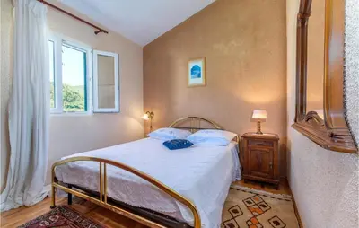 Krevet ili kreveti u jedinici u objektu Holiday Home Gata Bb Iv
