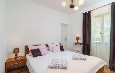 Krevet ili kreveti u jedinici u objektu Holiday Home Kalebiceva V
