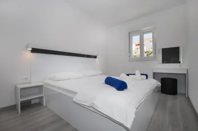 Krevet ili kreveti u jedinici u objektu Apartments Dragan