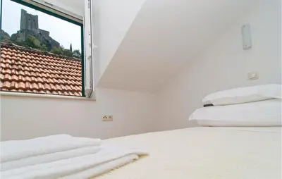 Krevet ili kreveti u jedinici u objektu 3 Bedroom Lovely Apartment In Omis