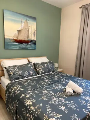 Krevet ili kreveti u jedinici u objektu Apartment Garden