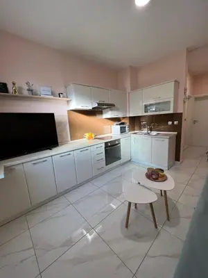 Kuhinja ili čajna kuhinja u objektu Apartment Garden