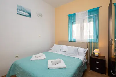 Krevet ili kreveti u jedinici u objektu Seaside Holiday Home Jelica