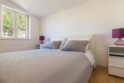 Krevet ili kreveti u jedinici u objektu MODERN apartment OMIS