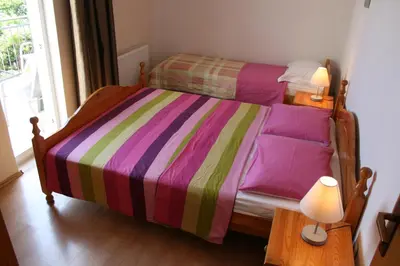 Krevet ili kreveti u jedinici u objektu Apartments Jakšić