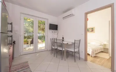 TV i/ili zabavni centar u objektu Apartment Tom