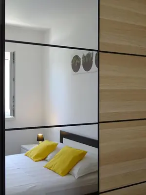 Krevet ili kreveti u jedinici u objektu 4pax Apartment ON THE BEACH with garden, sea view, terrace & parking - Ap A1
