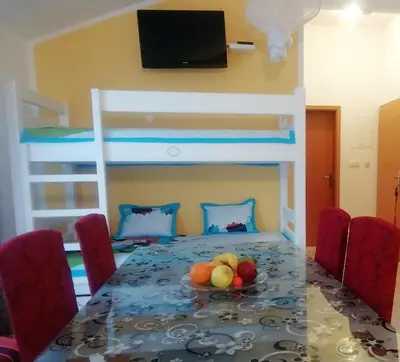 TV i/ili zabavni centar u objektu HAUS AM MEER bei NIKO&ANNA