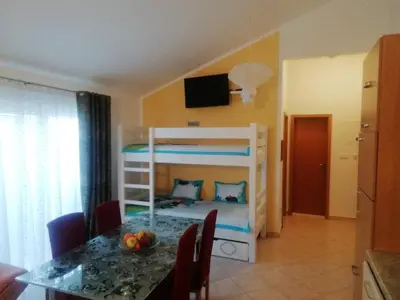 Krevet ili kreveti u jedinici u objektu HAUS AM MEER bei NIKO&ANNA