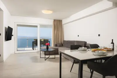 TV i/ili zabavni centar u objektu Seaside Luxury Apartment Tanita