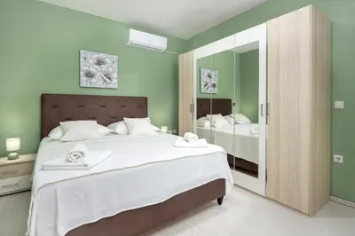 Krevet ili kreveti u jedinici u objektu Guest house LUCIJA with swimming pool