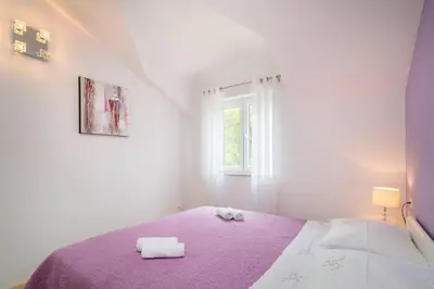 Krevet ili kreveti u jedinici u objektu Pavao Apartments